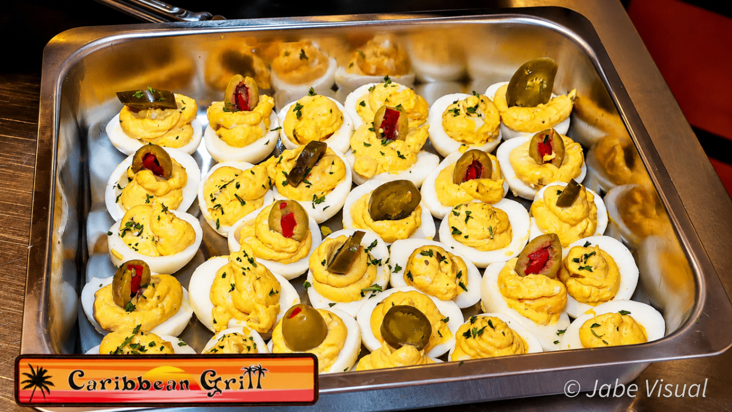 Deviled eggs with jalapeños and olives
